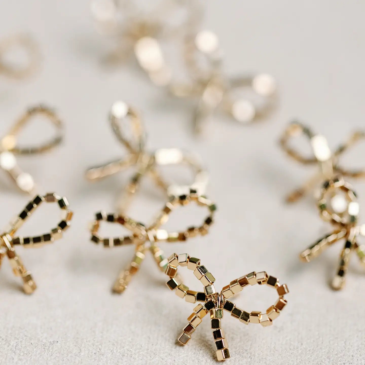 Mini Gold Beaded Bow Earrings